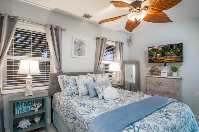 bedroom featuring a textured ceiling and ceiling fan