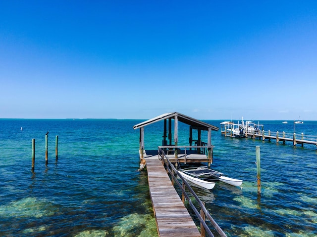 view of dock with a water view