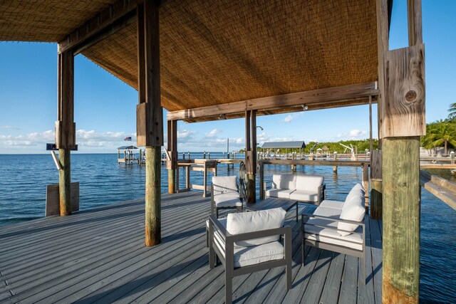 dock area with a water view