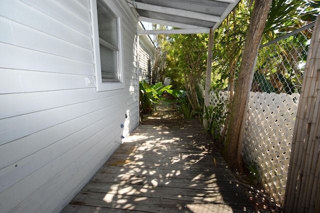 view of side of property featuring a deck