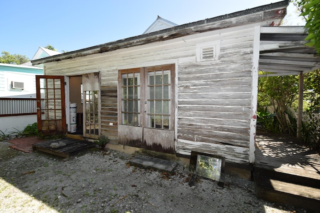 view of outbuilding with french doors