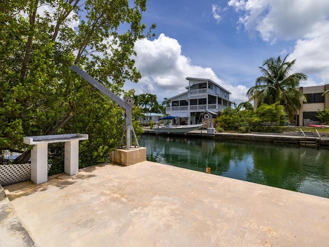 exterior space with a water view