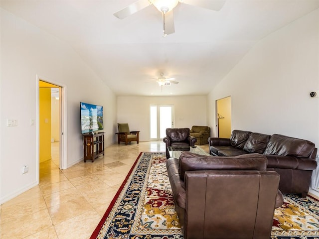 living room featuring lofted ceiling, light tile patterned floors, and ceiling fan