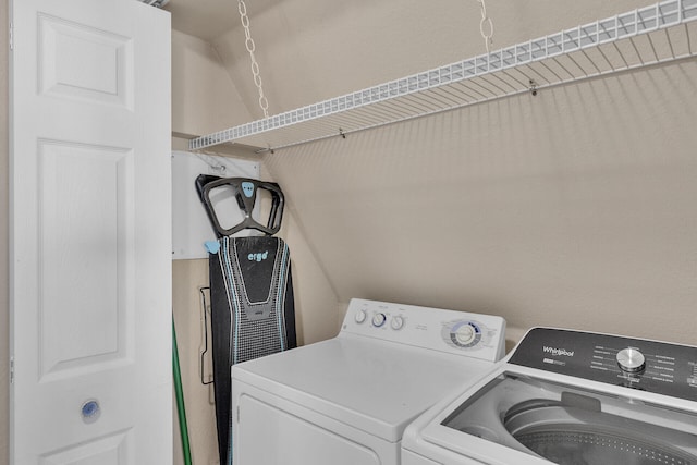 laundry area with separate washer and dryer