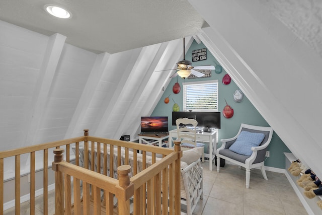 tiled bedroom with lofted ceiling