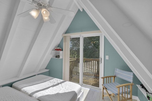 bedroom with wood-type flooring, lofted ceiling, access to outside, and ceiling fan