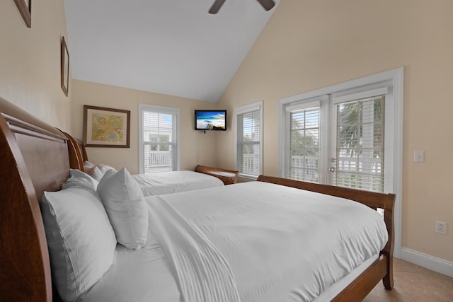 bedroom with ceiling fan, light tile patterned floors, high vaulted ceiling, and access to outside