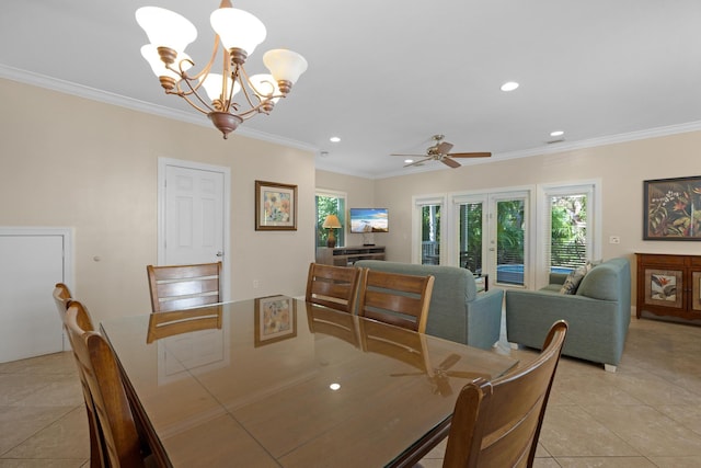 dining space with french doors, ornamental molding, and light tile patterned flooring