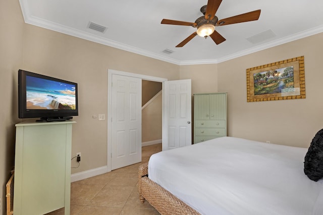 tiled bedroom featuring ceiling fan and ornamental molding