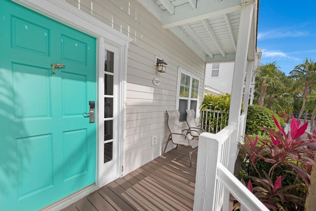 doorway to property featuring a porch