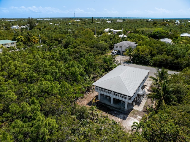 drone / aerial view with a view of trees