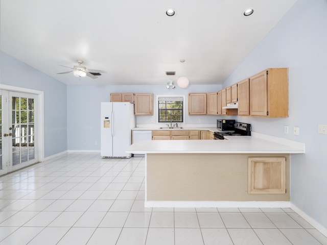 kitchen featuring under cabinet range hood, white fridge with ice dispenser, light brown cabinets, and light countertops