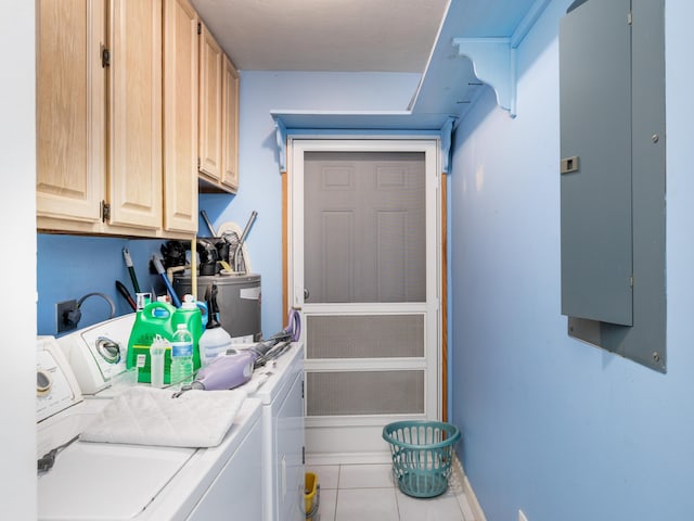 laundry area with tile patterned floors, cabinet space, and independent washer and dryer