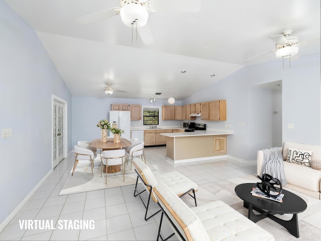 living room featuring vaulted ceiling, light tile patterned floors, baseboards, and ceiling fan