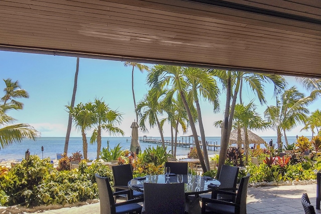 view of patio with a water view