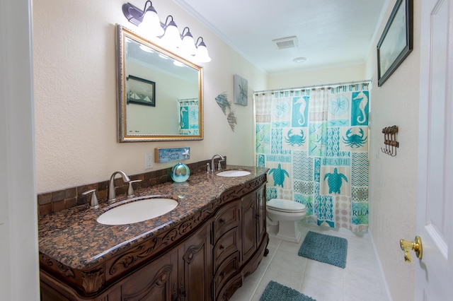 bathroom with tile patterned floors, toilet, ornamental molding, vanity, and curtained shower