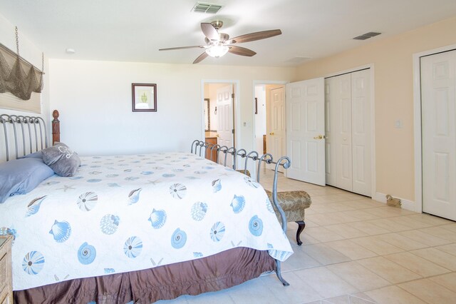 bedroom with light tile patterned floors and ceiling fan