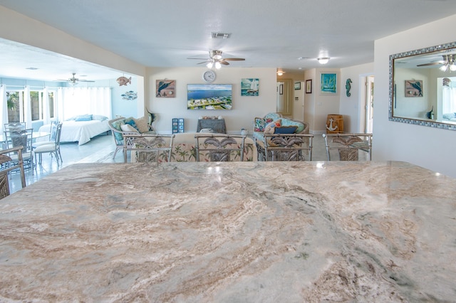 dining space featuring ceiling fan