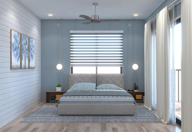 bedroom with ceiling fan and light wood-type flooring