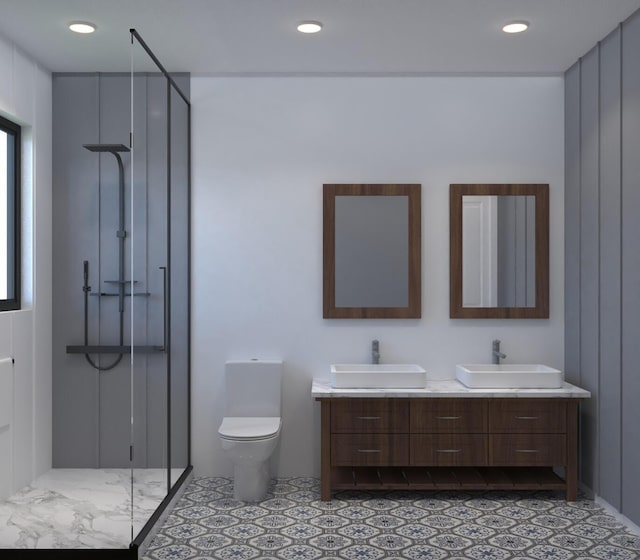 bathroom featuring vanity, toilet, a shower with shower door, and tile patterned flooring