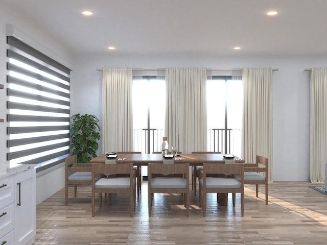 dining area featuring light wood-type flooring