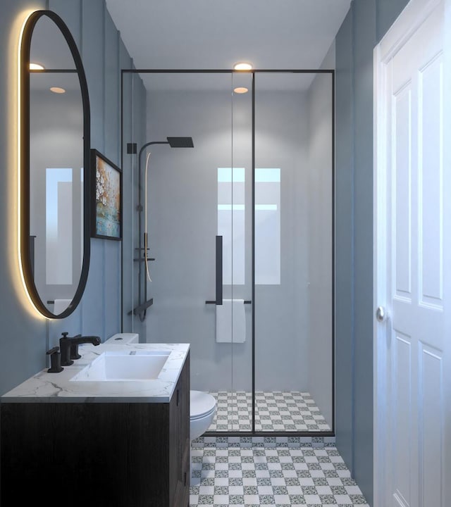 bathroom with vanity, toilet, and an enclosed shower