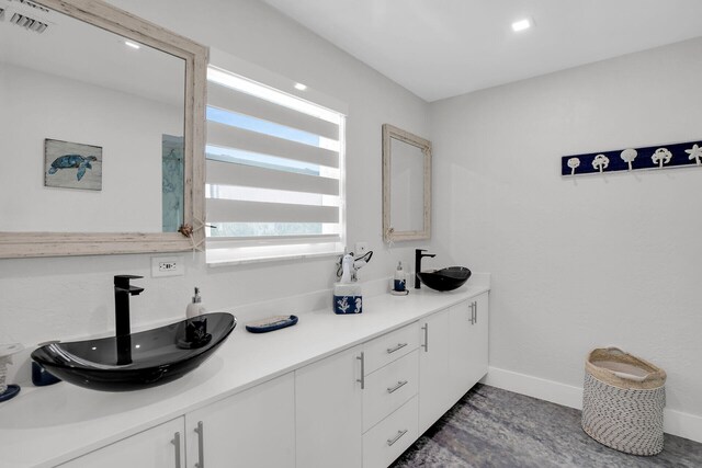 kitchen with sink and white cabinets