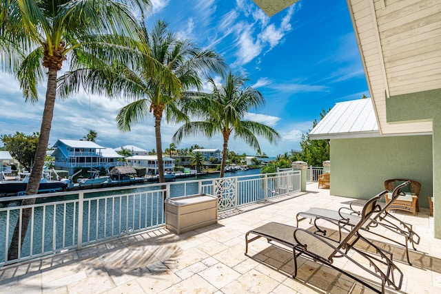 view of patio / terrace with a water view