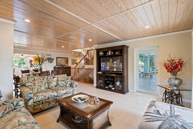 living room with crown molding, wooden ceiling, and light tile patterned flooring