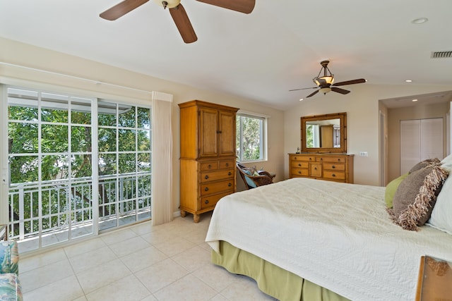 tiled bedroom with vaulted ceiling and ceiling fan