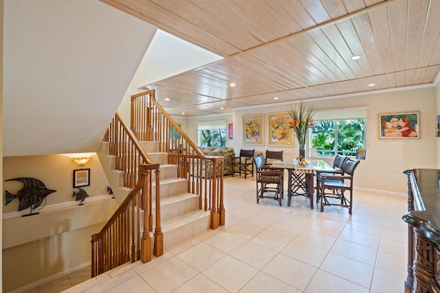 tiled dining area with wood ceiling