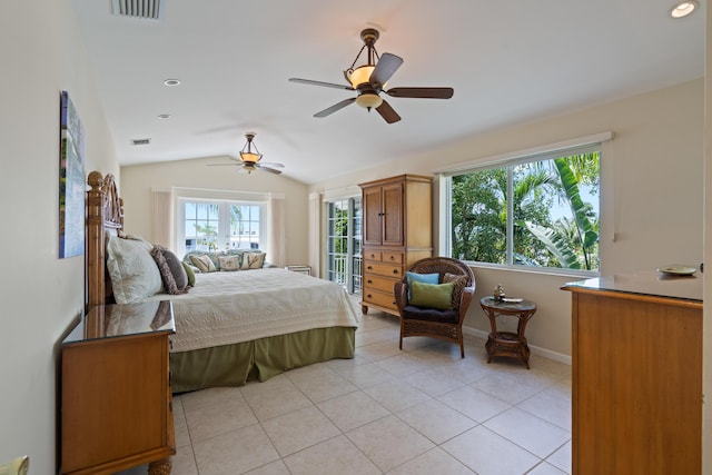 bedroom with lofted ceiling, light tile patterned floors, and ceiling fan