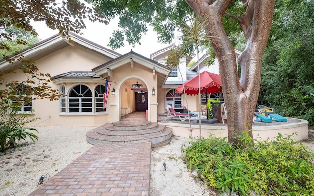 view of front of home with stucco siding