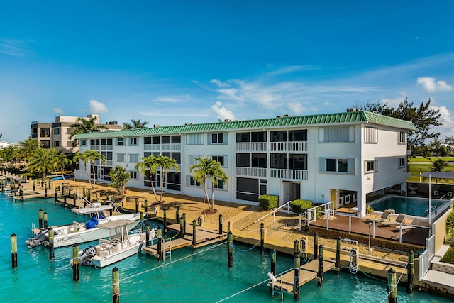 exterior space with a water view