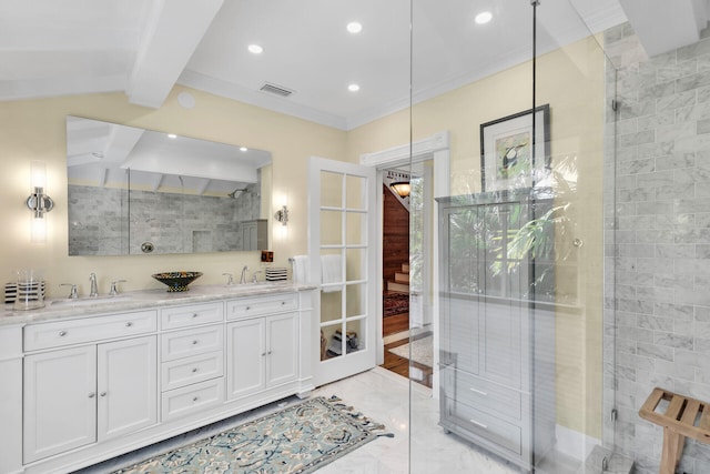 bathroom featuring vanity, crown molding, french doors, and walk in shower