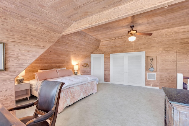 carpeted bedroom with wood ceiling, ceiling fan, lofted ceiling with beams, and wood walls