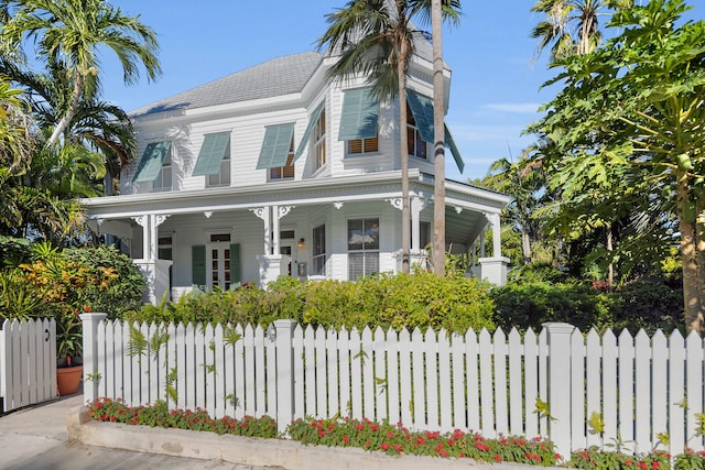 victorian-style house with a porch