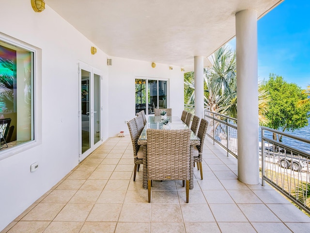 view of patio featuring a balcony