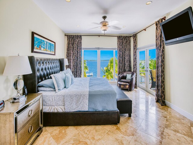 bedroom with access to exterior, ceiling fan, and french doors