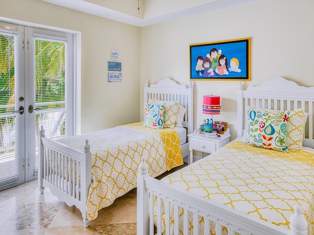 bedroom featuring french doors and access to outside