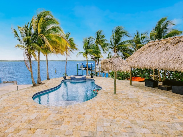 view of pool featuring a gazebo, a patio area, an in ground hot tub, and a water view