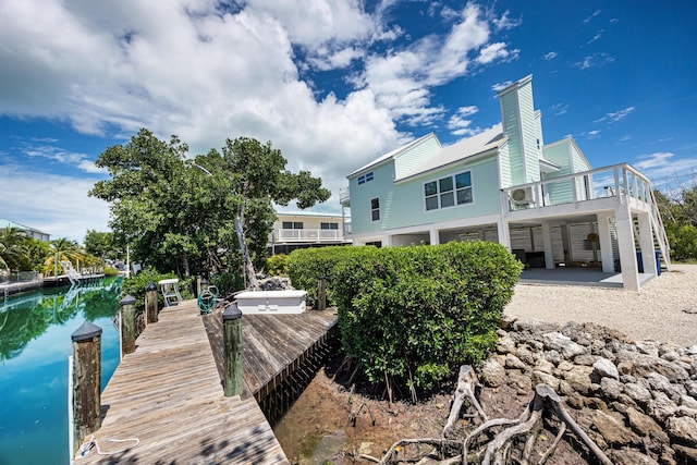 rear view of property with a patio area