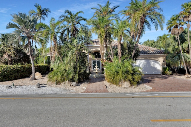 view of front of property with a garage