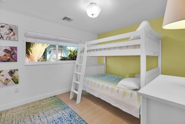 bedroom featuring light wood-type flooring