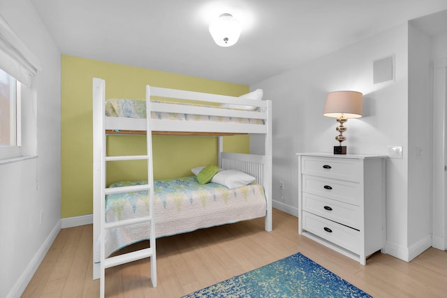 bedroom featuring light wood-type flooring