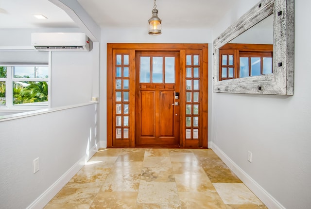 entrance foyer with an AC wall unit