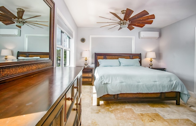 bedroom featuring ceiling fan and a wall mounted air conditioner