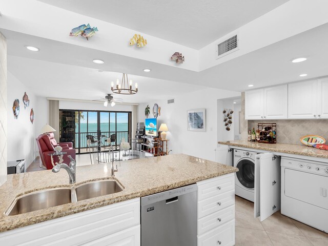 96000 Overseas Hwy Unit X2336Ftslip, Key Largo, FL 33037 - kitchen featuring washer / dryer, visible vents, a sink, and dishwasher