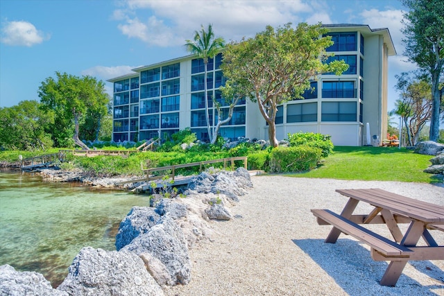 96000 Overseas Hwy Unit X2336Ftslip, Key Largo, FL 33037 - surrounding community featuring a lawn and a water view