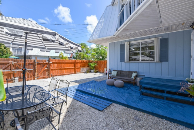 view of patio with a wooden deck